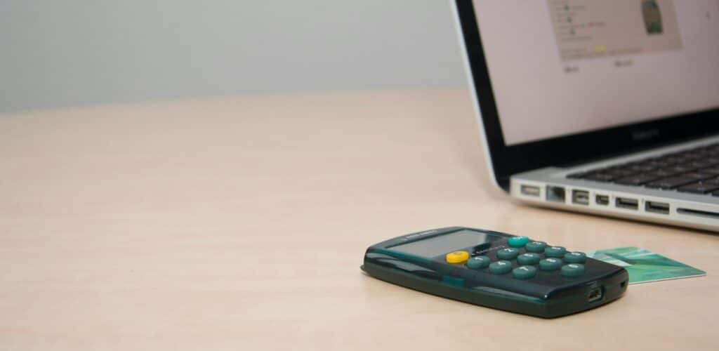 Laptop and credit card on the table